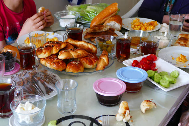 istock Turkish breakfast table, making a Turkish family breakfast, 999012210