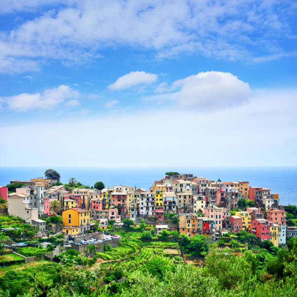 Corniglia is one of the five towns that make up the Cinque Terre region in Italy. Composite photo