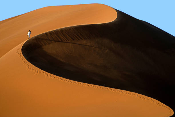 istock Dunes Walking, Sahara, Erg Chebbi, Morocco 999022458