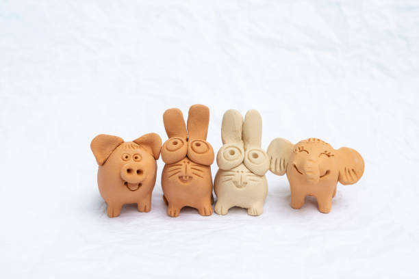 istock Happy animal sculpture isolate on white background, happy animal clay design 999025686