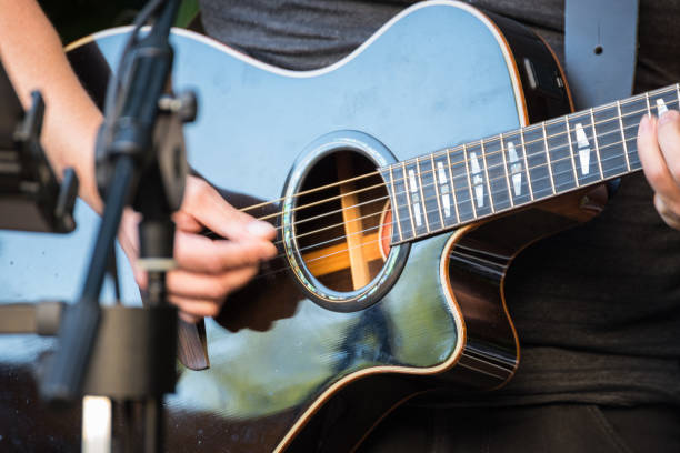istock Guitar player with the guitar in hand 999034792