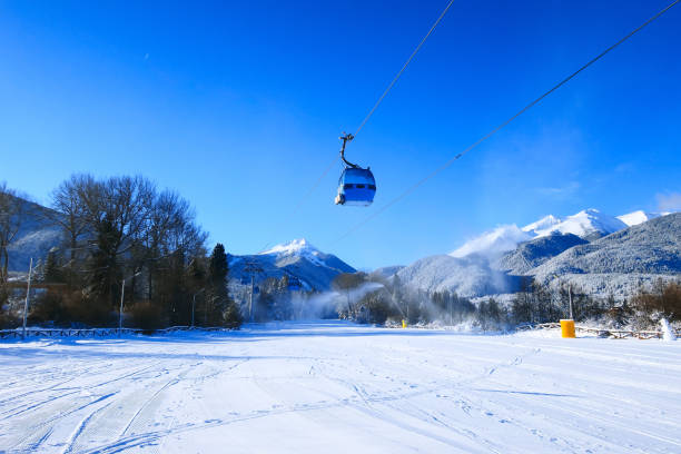 istock Bansko cable car cabin and snow peaks, Bulgaria 999073536
