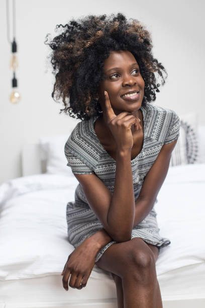 istock African woman thinking 999076622