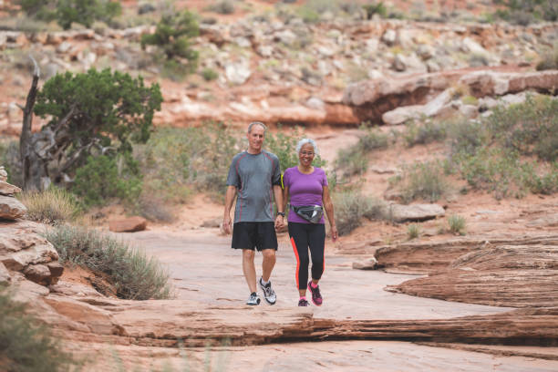 istock Senior Couple Hiking in Desert 999077146