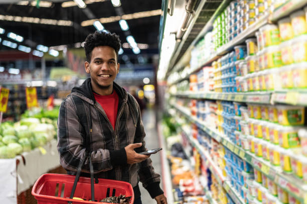 istock Customer Buying with mobile app on Supermarket 999084238