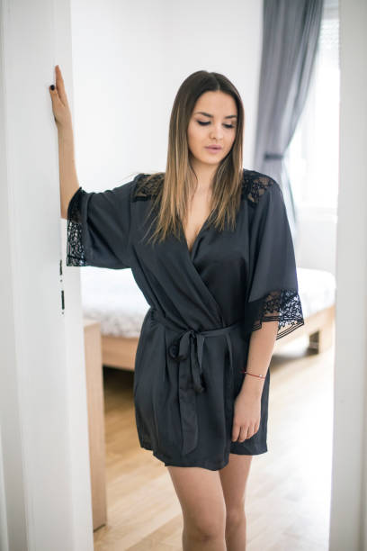 istock Young woman in nightwear 999087350
