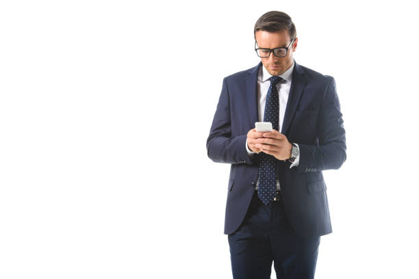 istock serious businessman in eyeglasses checking smartphone isolated on white background 999087372
