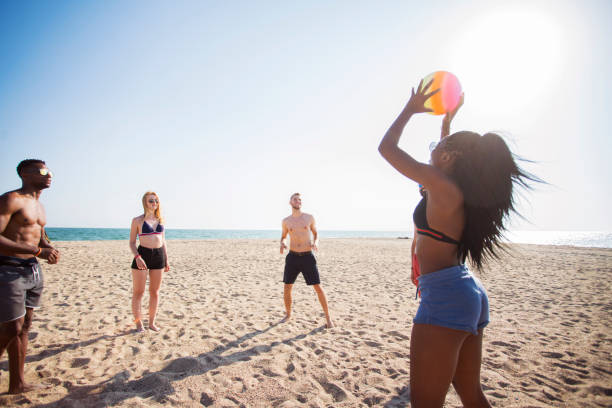 istock Volleyball with friends at the beach 999094170