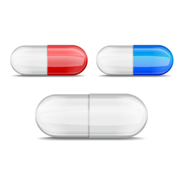 istock Realistic pills collection. Vector set of red, blue, white capsule shaped tablets. Medicine and drugs 999100948