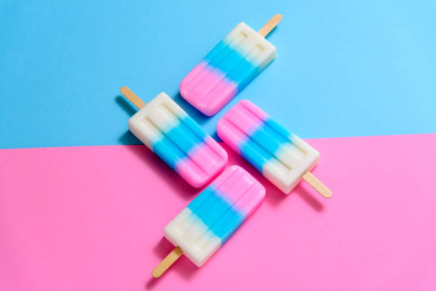 istock Fruit Ice cream stick , popsicle , ice pop or freezer pop with copyspace on blue and pink pastel background or texture 999105150