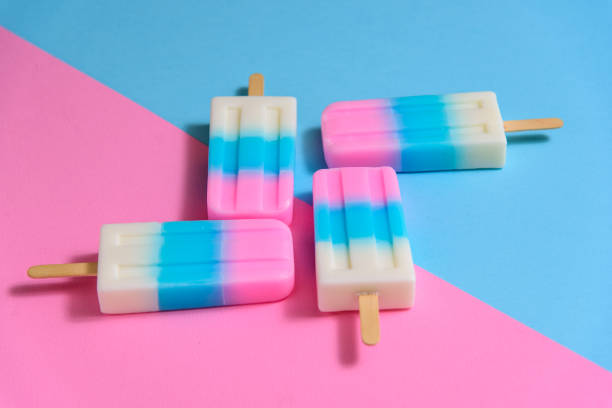 istock Fruit Ice cream stick , popsicle , ice pop or freezer pop with copyspace on blue and pink pastel background or texture 999105168