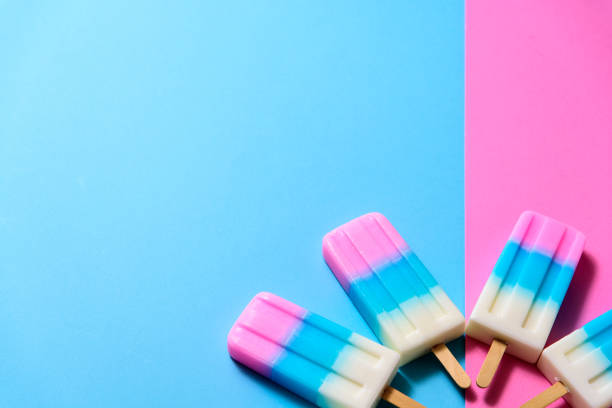 istock Fruit Ice cream stick , popsicle , ice pop or freezer pop with copyspace on blue and pink pastel background or texture 999105184