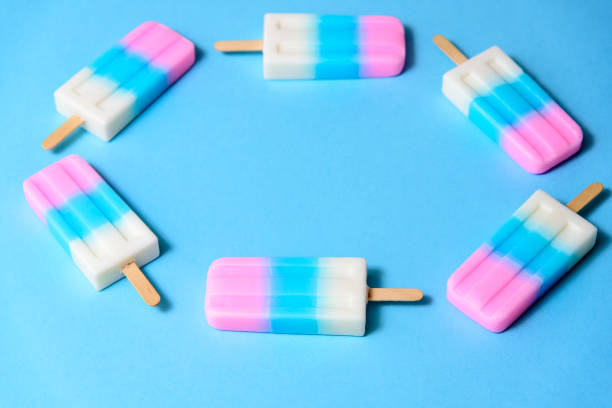 istock Fruit Ice cream stick , popsicle , ice pop or freezer pop with copyspace on blue pastel background or texture 999105224