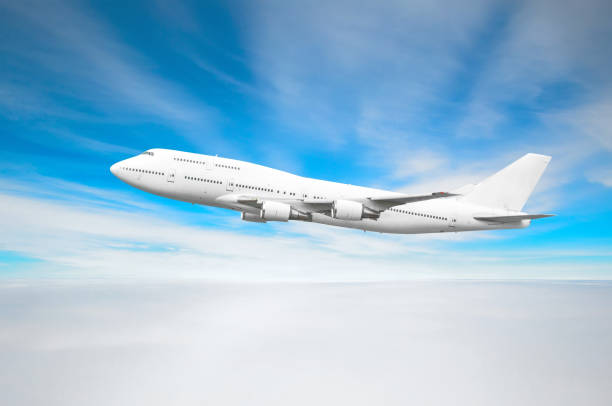 istock Passenger aircraft flies in the sky above the clouds. 999114486
