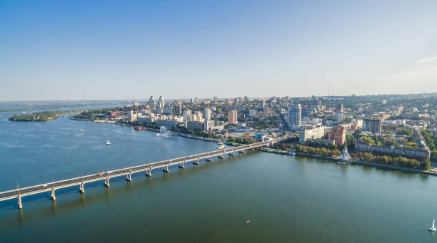 Aerial view on the central bridge of Dnieper Aerial view on the central bridge of Ukrainian city of Dnieper (Dnipropetrovsk) located on the bank of the big river. dnipropetrovsk stock pictures, royalty-free photos & images