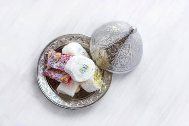 istock Traditional Turkish sweets lukum on silver saucer with lid 999128264