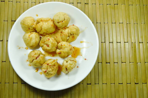 istock crispy  fried fish ball dressing spicy and sweet sauce 999144620