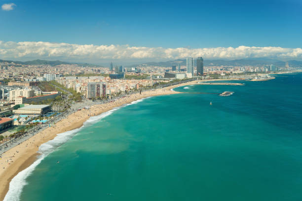 Aerial view of Barcelona, Barceloneta beach and Mediterranean sea in summer day at Barcelona, Spain. Aerial view of Barcelona, Barceloneta beach and Mediterranean sea in summer day at Barcelona, Spain. barcelona beach stock pictures, royalty-free photos & images