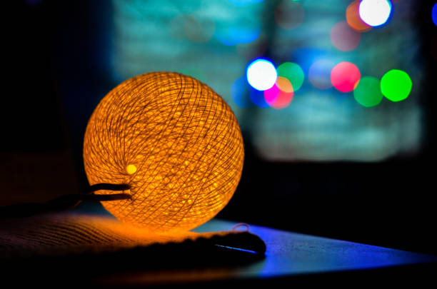 round festival light in orange with bokeh