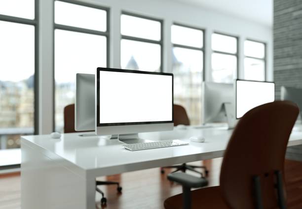 istock Desktop Computer Mock-up with white Screen Stands on the Office Desk 999148854