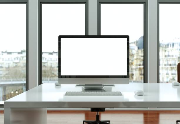 istock Desktop Computer Mock-up with white Screen Stands on the Office Desk 999148914