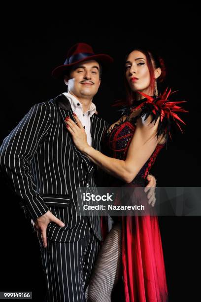 Dangerous Bonny And Clyde Gangster With 1920 Style Clothes Standing With A  Gun Stock Photo - Download Image Now - iStock