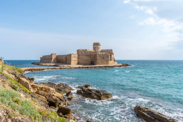 Le Castella, ancient castle on the sea in Calabria, Italy Le Castella, ancient castle on the sea in Calabria, Italy calabria stock pictures, royalty-free photos & images