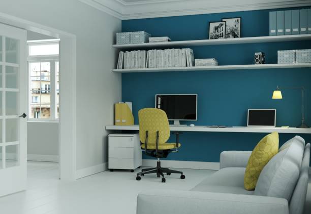 istock Modern home office with yellow chair and blue wall interior design 3d Rendering 999151842