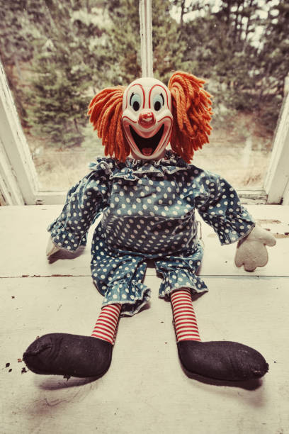 istock Creepy Clown in Window 999155492