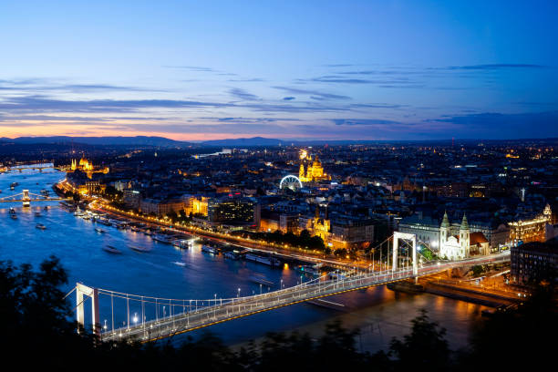 Budapest, Hungary. July 2018.  The view of Erzsebet bridge on the Danube river at night in Budapest, Hungary