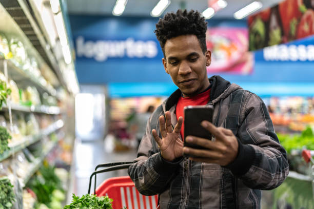 istock Customer Making a Video Chat at Supermarket 999161886
