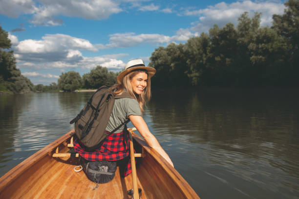 istock Woman in canoe 999164328