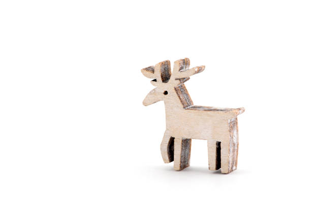 istock Wooden reindeer Christmas decoration on white background 999190472