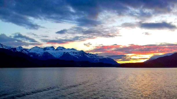 istock Alaska sunset with snow capped mountain 999206842