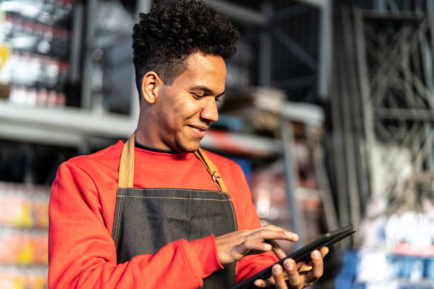 istock Man working at a inventory in a backroom storage 999225530