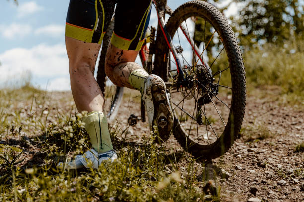 istock back dirty feet mountain biker 999241136