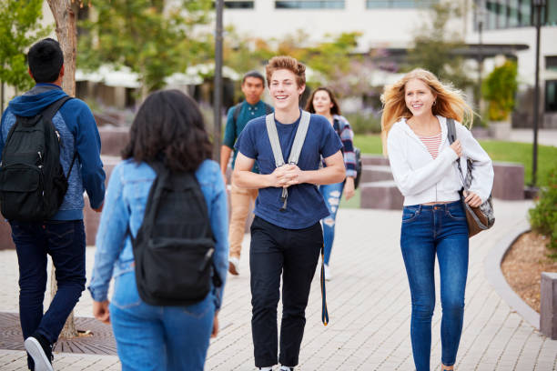 istock High School Students Socializing Outside College Buildings 999249288