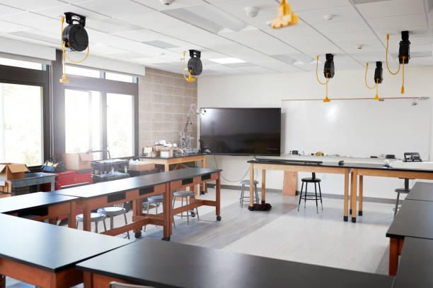 istock Robotic Vehicle On Desk In Empty Science Classroom 999249550