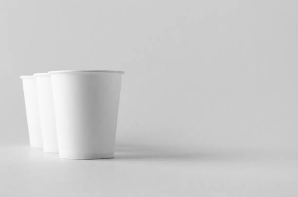 istock 8 oz. white coffee paper cup mock-up without lid. 999258718