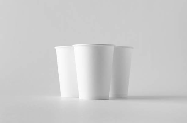 istock 12 oz. white coffee paper cup mock-up without lid. 999264162