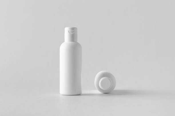 istock White plastic cosmetic lotion bottle mock-up with cap. 999283234