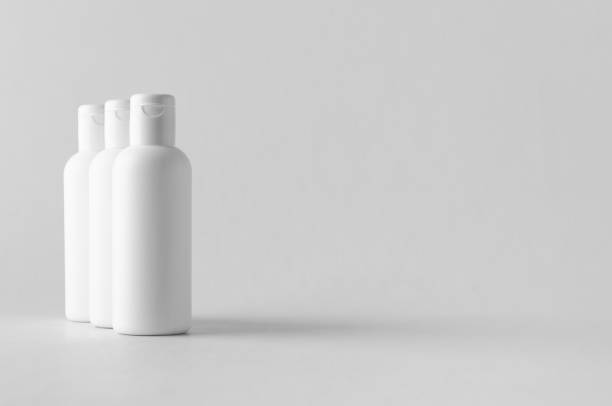 istock White plastic cosmetic lotion bottle mock-up with cap. 999285294