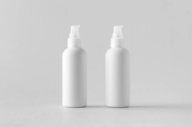 istock White plastic cosmetic foam pump bottle mock-up. 999288754