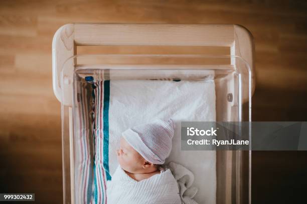 Newborn Baby Sleeping In Hospital Bassinet Stock Photo - Download Image Now - Newborn, Hospital, Baby - Human Age