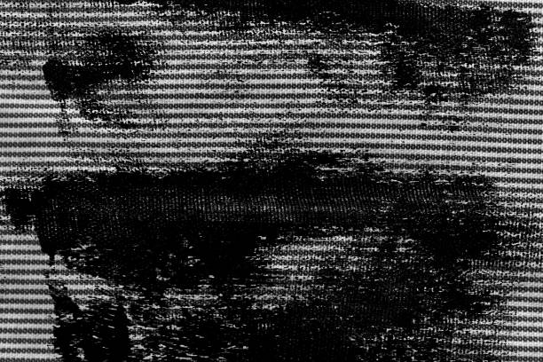 istock Grunge Black and white closeup of stripped fabric texture. 999318868