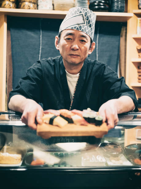 istock Tokyo Japan Sushi Chef 999323114
