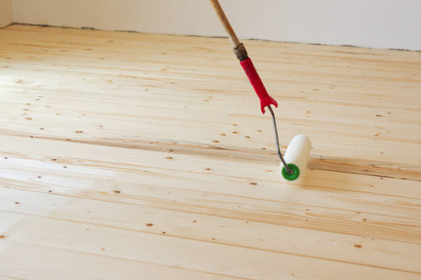 istock Lacquering wood floors 999342500