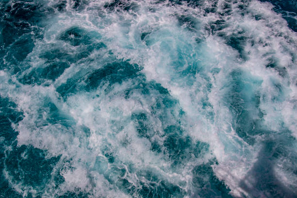 istock Ocean surface, sea foam on blue ocean 999342898