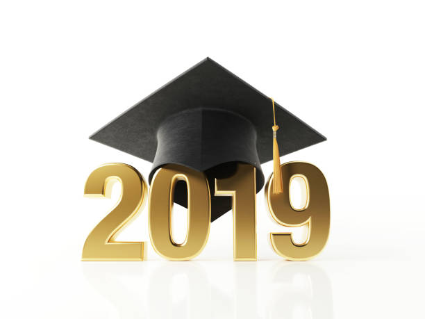 istock Golden 2019 Wearing A Black Mortarboard on White Background 999345222