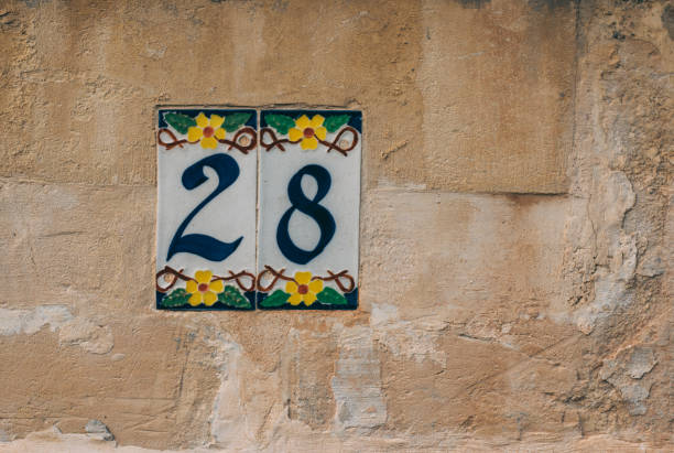 istock Number 28 on the building wall 999347842